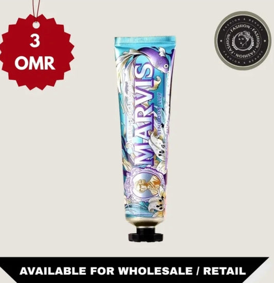 Marvis toothpaste tube with a price tag and promotional text on a light gray background